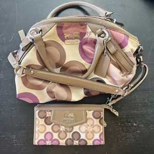 Coach purse and matching wallet. Needs cleaned but very pretty.